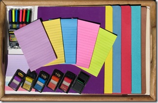 Colored folders, notepads, markers, tabs